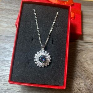 Elegant Silver Necklace with Iridescent Gemstone